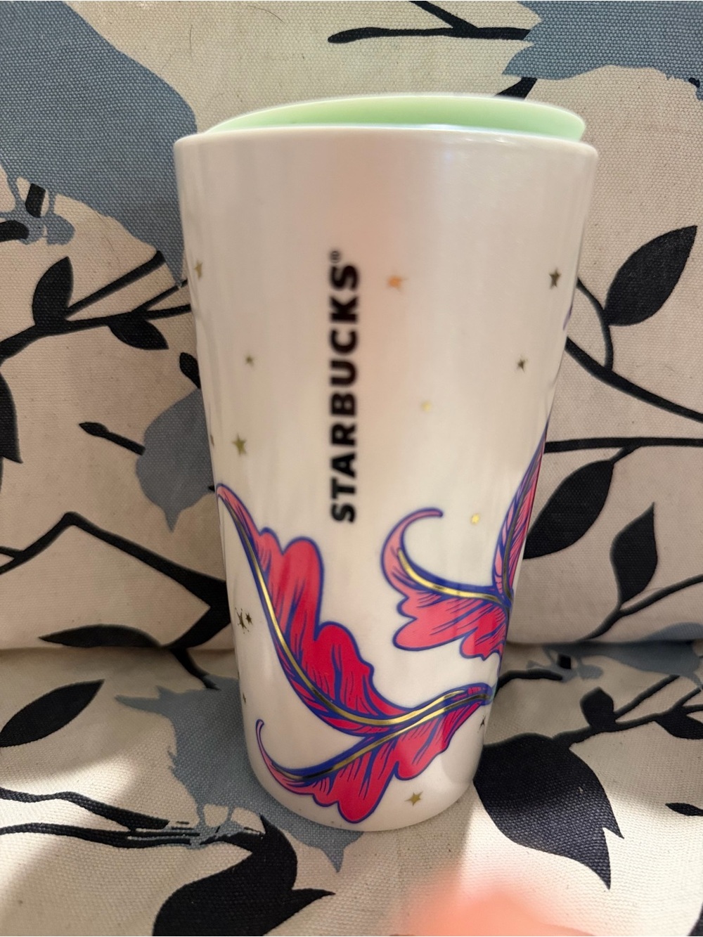 Starbucks White Ceramic Cup with Pink and Purple Feather Art